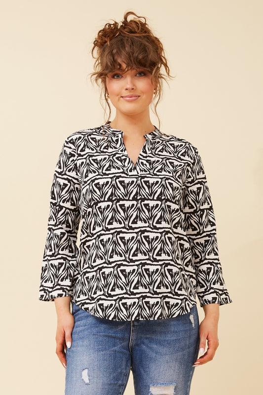 SPICY ABSTRACT PRINT BLOUSE
