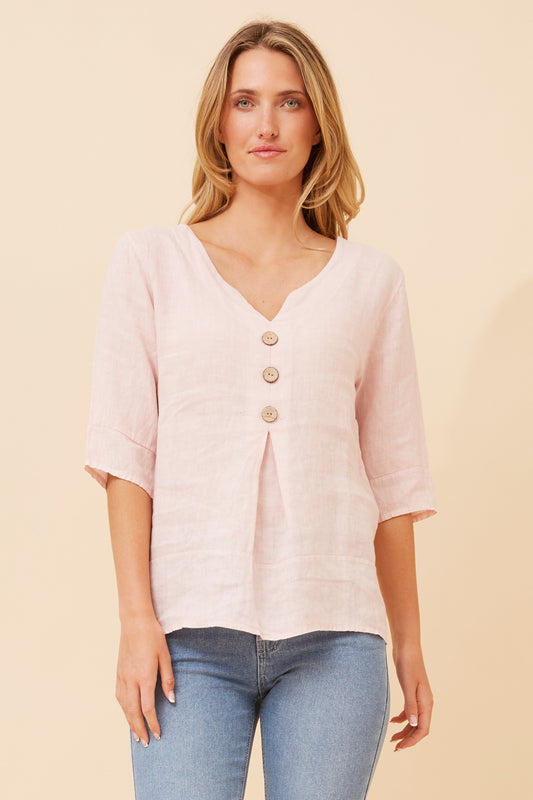 Etna Solid Linen Top in LIGHT PINK – lightweight linen weave texture, relaxed fit with V-neck and 3/4 sleeves. Front close-up view.